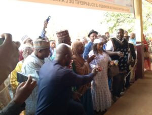 cutting the ribbon Koupa Menke