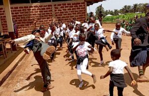 pupils dancing at Mbaw